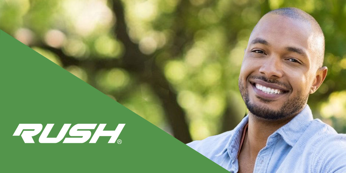 Guy smiling after eating Rush tobacco free nicotine pouches